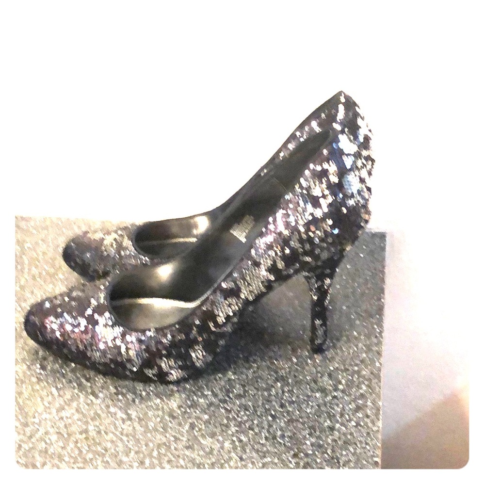 Black Sequins heel shoes.